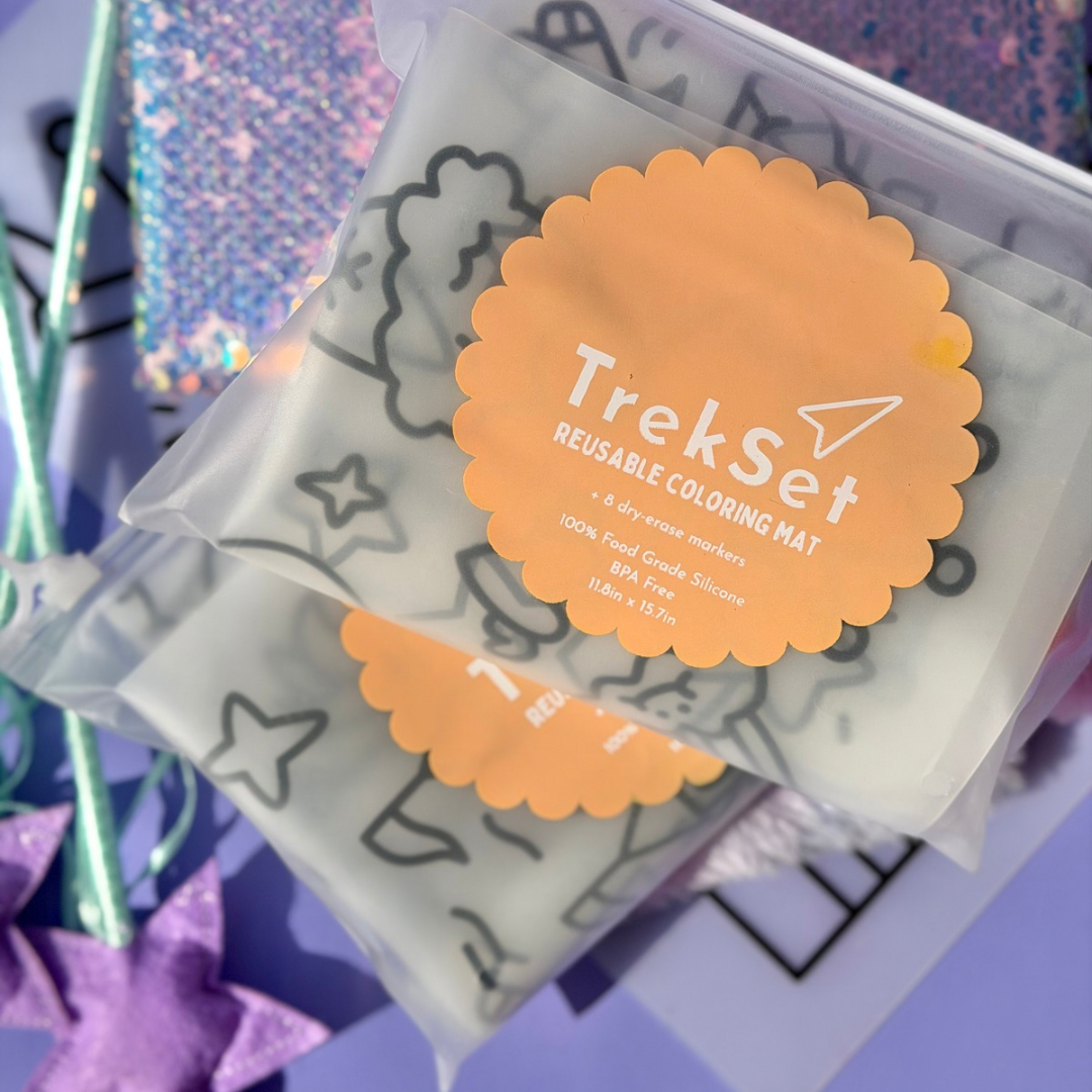 Reusable coloring mat packaging with orange label on a colorful background